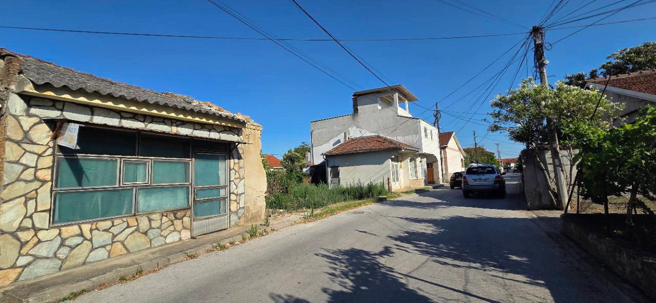 Urban surroundings and access street by the land in central Gevgelija
